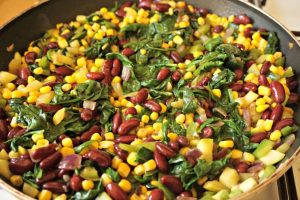 Veggies beans and corn mixed for vegetarian enchiladas