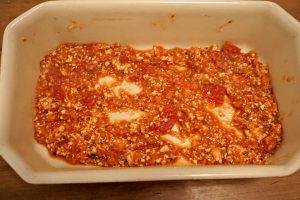 First sauce layer of Vegan Eggplant Lasagna
